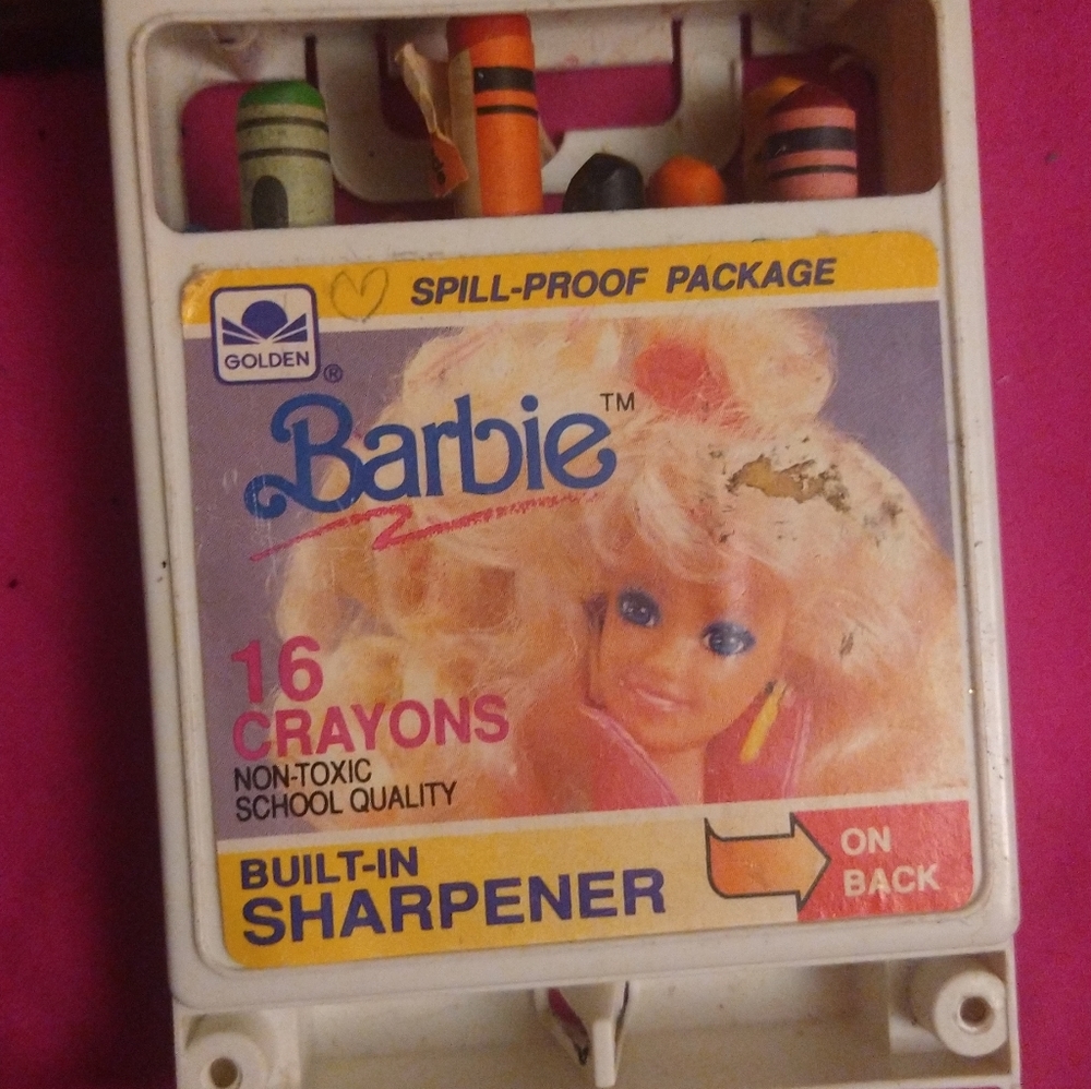 Barbie crayon holder with sharpener.
